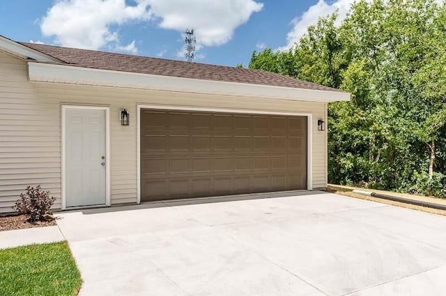 810 Capman St, Milton, WI 53563 - garage with concrete driveway