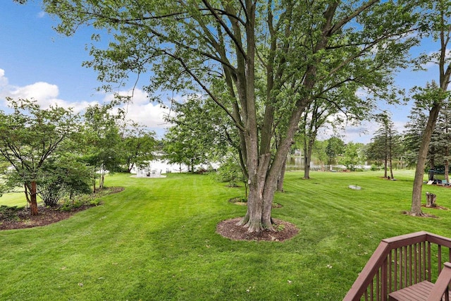521 Maunesha Dr, Marshall, WI 53559 - view of green lawn featuring a water view