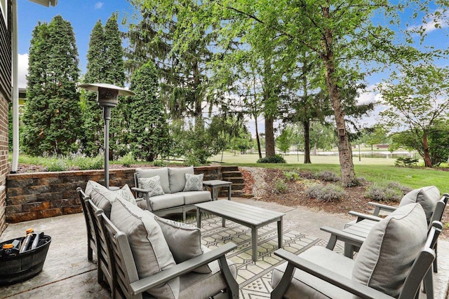 521 Maunesha Dr, Marshall, WI 53559 - view of patio featuring an outdoor hangout area