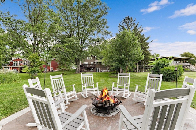 521 Maunesha Dr, Marshall, WI 53559 - view of patio with an outdoor fire pit