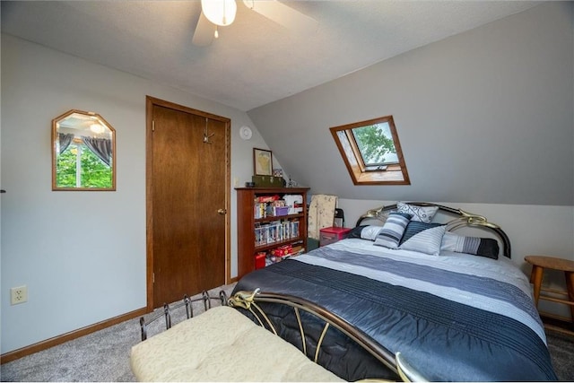 1674 W White Ash Dr, Balsam Lake, WI 54810 - bedroom with carpet flooring, a skylight, lofted ceiling, and a ceiling fan