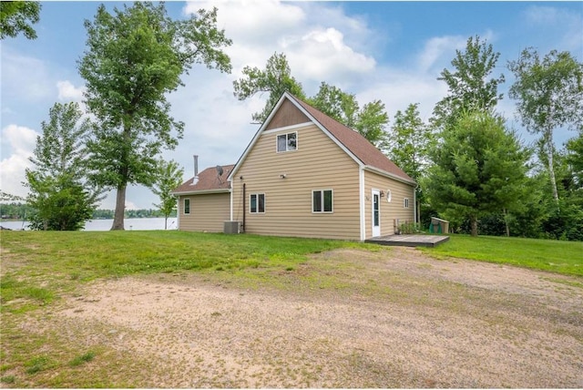 1674 W White Ash Dr, Balsam Lake, WI 54810 - view of home's exterior featuring a deck with water view and a yard