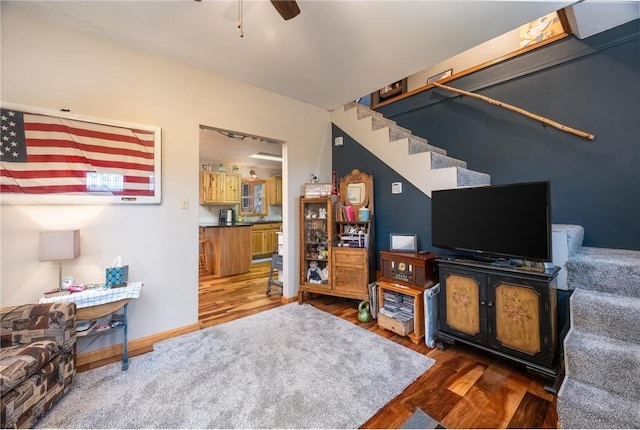 1674 W White Ash Dr, Balsam Lake, WI 54810 - living area with stairway, wood finished floors, and ceiling fan