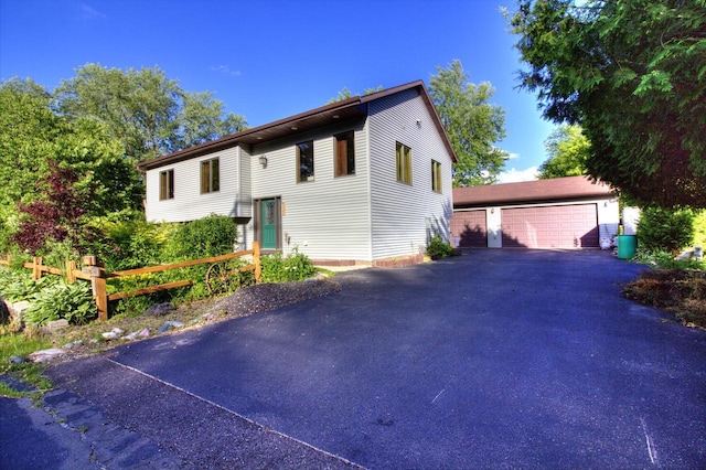 W1387 W Post Rd, Genoa City, WI 53128 - bi-level home featuring an outbuilding and a detached garage
