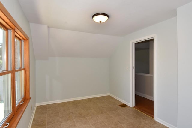 2744 N Lefeber Ave, Wauwatosa, WI 53210 - additional living space with healthy amount of natural light and vaulted ceiling