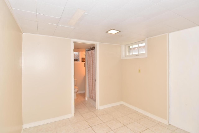 2744 N Lefeber Ave, Wauwatosa, WI 53210 - empty room featuring light tile patterned flooring and baseboards