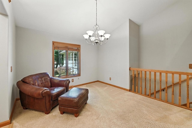 520 Bayberry Ln, Slinger, WI 53086 - sitting room with carpet flooring, a chandelier, and vaulted ceiling