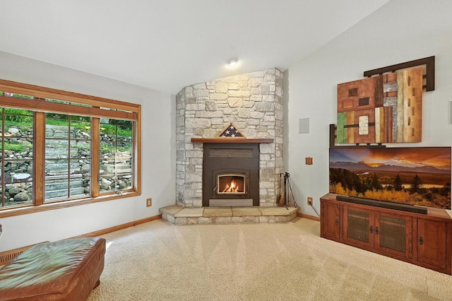 520 Bayberry Ln, Slinger, WI 53086 - living area with vaulted ceiling, carpet flooring, and a fireplace