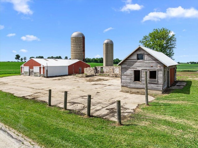 5306 Hillcrest Dr, Allenton, WI 53002 - view of grassy yard featuring an outbuilding and a garage