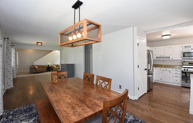 11811 213th Ave, Bristol, WI 53104 - dining area featuring dark wood-style flooring