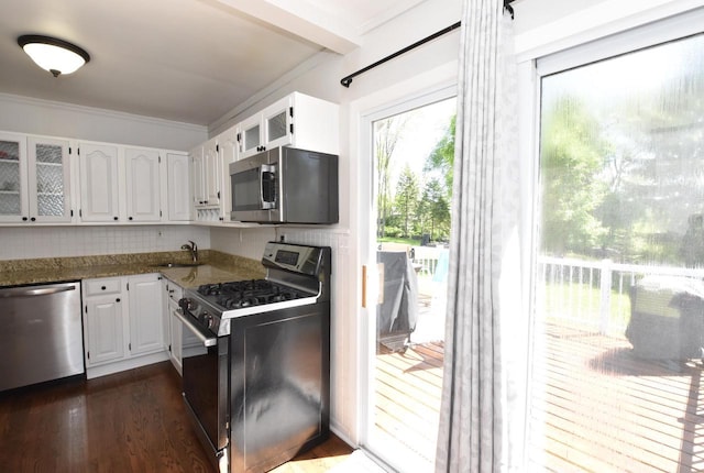 11811 213th Ave, Bristol, WI 53104 - kitchen featuring appliances with stainless steel finishes, white cabinets, glass insert cabinets, dark wood-type flooring, and ornamental molding
