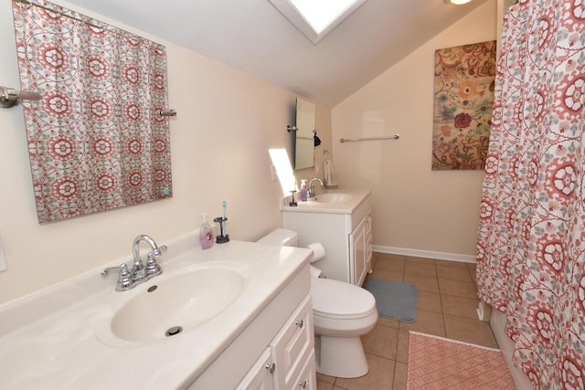 11811 213th Ave, Bristol, WI 53104 - bathroom featuring vanity, vaulted ceiling, tile patterned floors, and a skylight