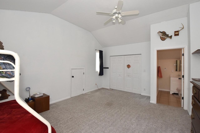 11811 213th Ave, Bristol, WI 53104 - unfurnished bedroom with vaulted ceiling, carpet floors, a closet, ensuite bathroom, and a ceiling fan
