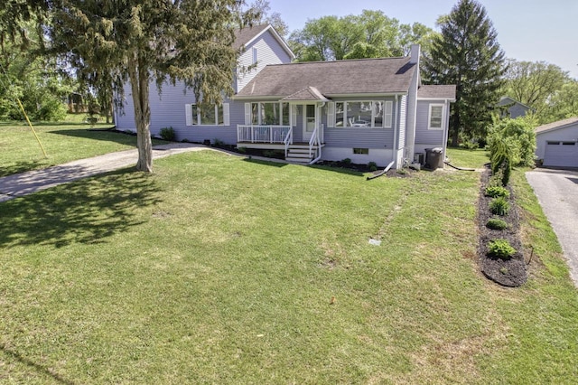 11811 213th Ave, Bristol, WI 53104 - view of front of home with a front lawn, a shingled roof, and covered porch