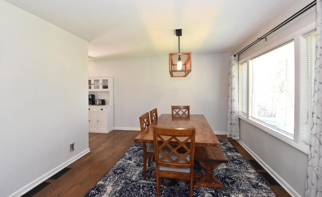 11811 213th Ave, Bristol, WI 53104 - dining area featuring dark wood finished floors and baseboards