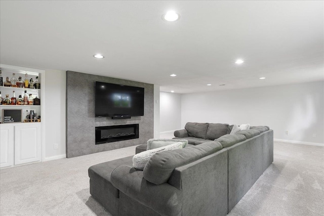 615 N Peach Ave, Marshfield, WI 54449 - living room featuring carpet flooring, recessed lighting, and a large fireplace
