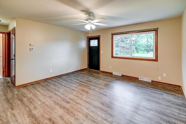 5716 Sauk Ln, Mcfarland, WI 53558 - empty room featuring wood finished floors and ceiling fan
