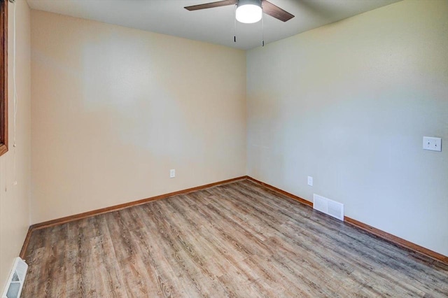 5716 Sauk Ln, Mcfarland, WI 53558 - empty room with wood finished floors and a ceiling fan