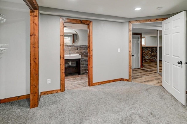 5716 Sauk Ln, Mcfarland, WI 53558 - unfurnished bedroom with carpet flooring, recessed lighting, and ensuite bath