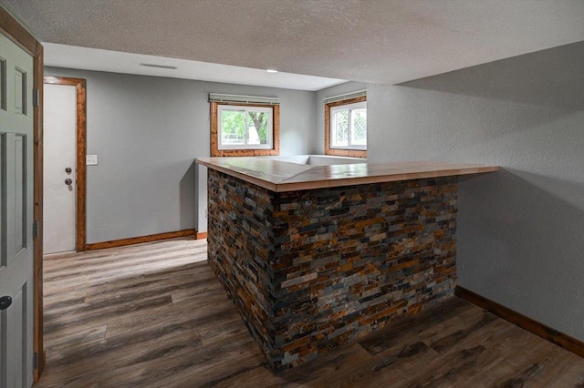 5716 Sauk Ln, Mcfarland, WI 53558 - indoor dry bar with wood finished floors and a textured ceiling