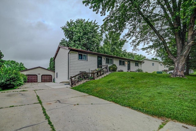 5716 Sauk Ln, Mcfarland, WI 53558 - ranch-style house with an outdoor structure, a front yard, and a garage