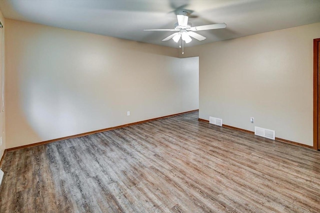 5716 Sauk Ln, Mcfarland, WI 53558 - empty room with wood finished floors and a ceiling fan