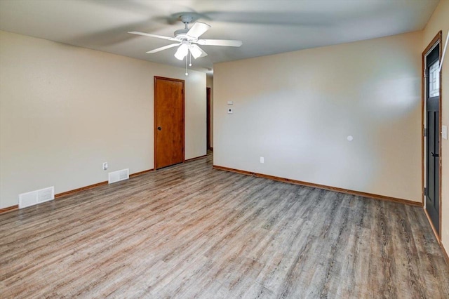 5716 Sauk Ln, Mcfarland, WI 53558 - unfurnished room with wood finished floors and ceiling fan
