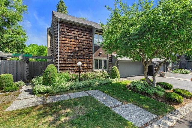 36 Stonewood Ct Unit 36, Wind Point, WI 53402 - view of front facade with driveway and a garage