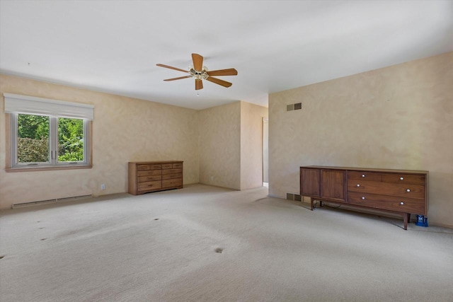 36 Stonewood Ct Unit 36, Wind Point, WI 53402 - carpeted empty room featuring a baseboard radiator and ceiling fan
