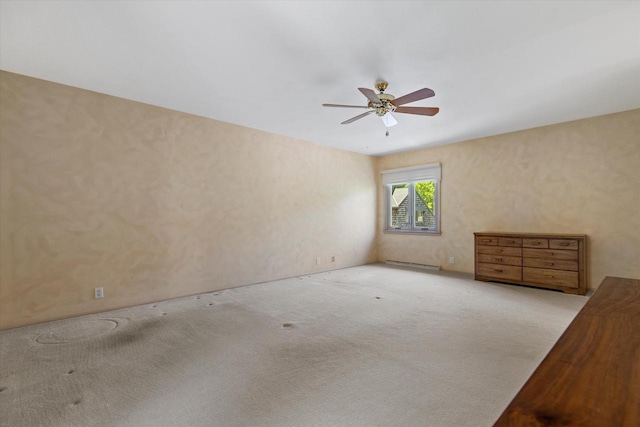 36 Stonewood Ct Unit 36, Wind Point, WI 53402 - carpeted spare room with a ceiling fan and baseboard heating