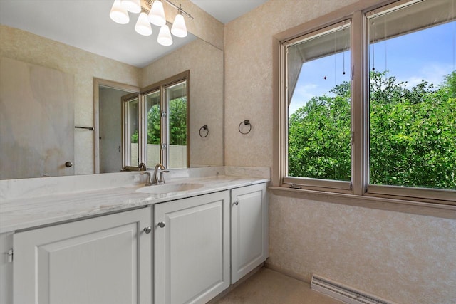 36 Stonewood Ct Unit 36, Wind Point, WI 53402 - bathroom with vanity and a baseboard heating unit