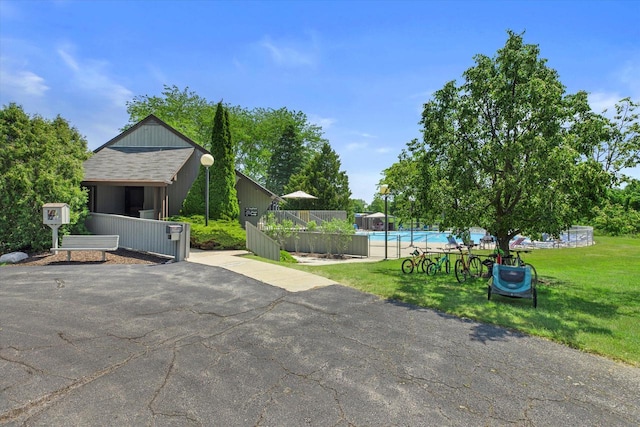 36 Stonewood Ct Unit 36, Wind Point, WI 53402 - view of patio / terrace featuring a swimming pool