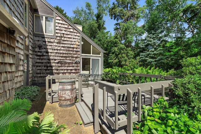 36 Stonewood Ct Unit 36, Wind Point, WI 53402 - exterior space featuring outdoor dining space and a chimney