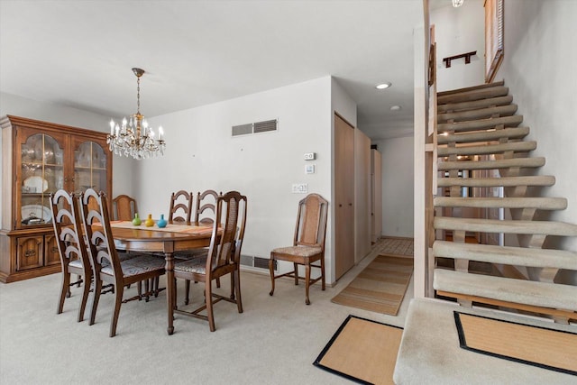 36 Stonewood Ct Unit 36, Wind Point, WI 53402 - dining room featuring light colored carpet, a chandelier, recessed lighting, and stairway