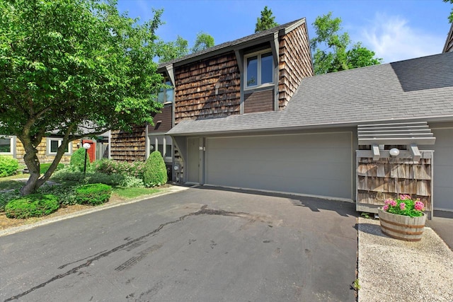 36 Stonewood Ct Unit 36, Wind Point, WI 53402 - view of front facade featuring driveway