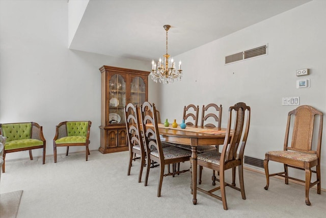 36 Stonewood Ct Unit 36, Wind Point, WI 53402 - dining space with a chandelier and light carpet