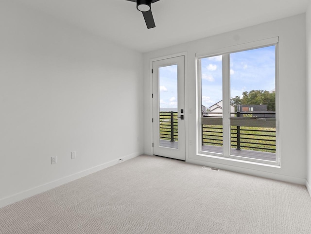 9352 S Alder Pl Unit 105, Oak Creek, WI 53154 - empty room with light carpet and a ceiling fan