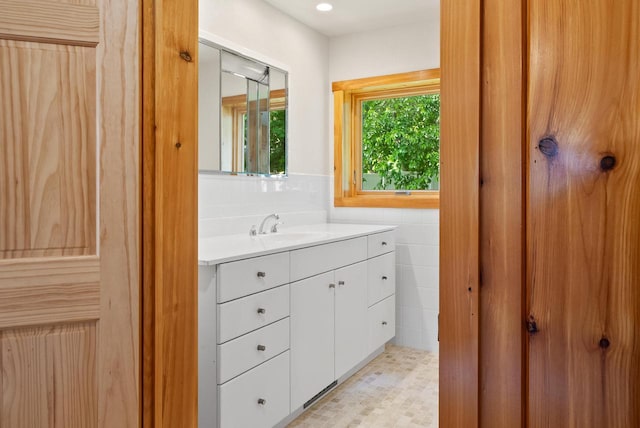N3245 Walnut Rd, Lake Geneva, WI 53147 - bathroom with vanity, tile walls, and recessed lighting