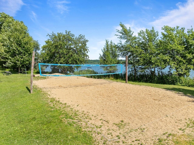 N3245 Walnut Rd, Lake Geneva, WI 53147 - view of property's community with a yard, volleyball court, and a water view