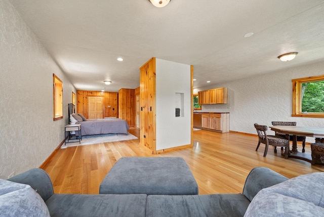 N3245 Walnut Rd, Lake Geneva, WI 53147 - living area with light wood-style floors, a textured wall, and recessed lighting