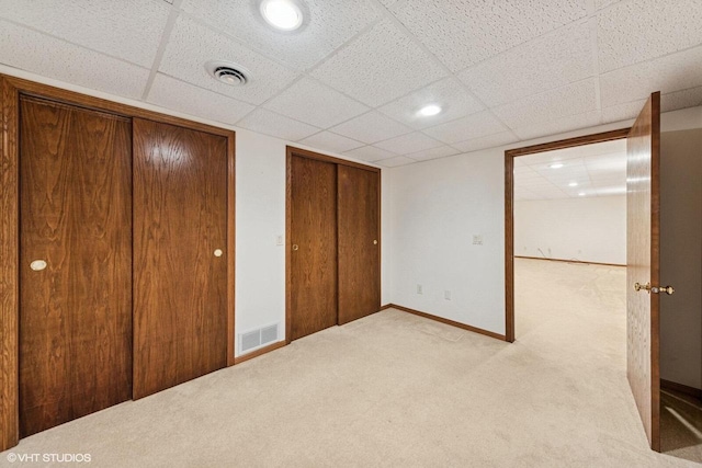 911 Park Cir, Union Grove, WI 53182 - unfurnished bedroom featuring carpet flooring, a paneled ceiling, and recessed lighting