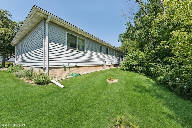 911 Park Cir, Union Grove, WI 53182 - view of home's exterior with a lawn