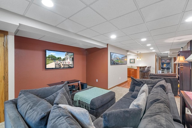 1948 Field Cliffe Dr, Richfield, WI 53076 - cinema room with bar area, a drop ceiling, light wood-style flooring, and recessed lighting