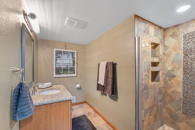 1948 Field Cliffe Dr, Richfield, WI 53076 - full bathroom with vanity, tiled shower, and a textured ceiling