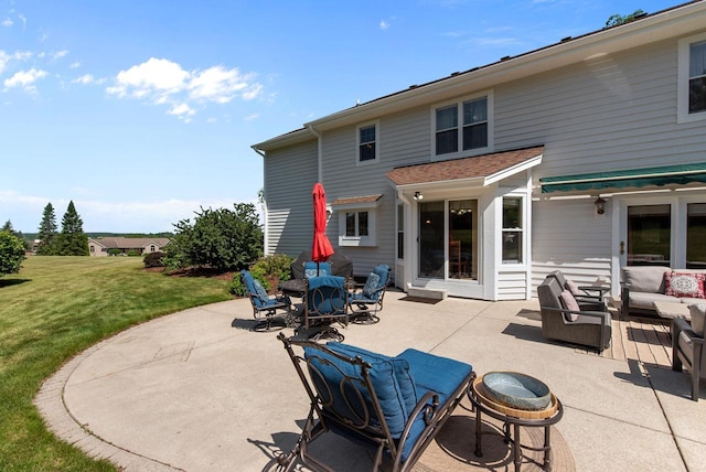 1948 Field Cliffe Dr, Richfield, WI 53076 - back of property featuring a patio, outdoor lounge area, and a yard