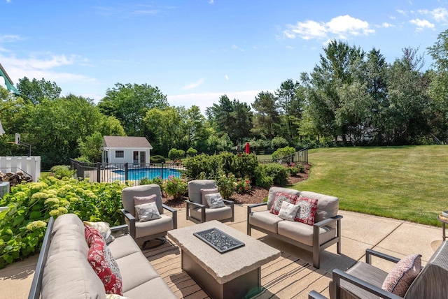 1948 Field Cliffe Dr, Richfield, WI 53076 - view of patio / terrace featuring an outdoor living space with a fire pit, an outbuilding, and view of scattered trees