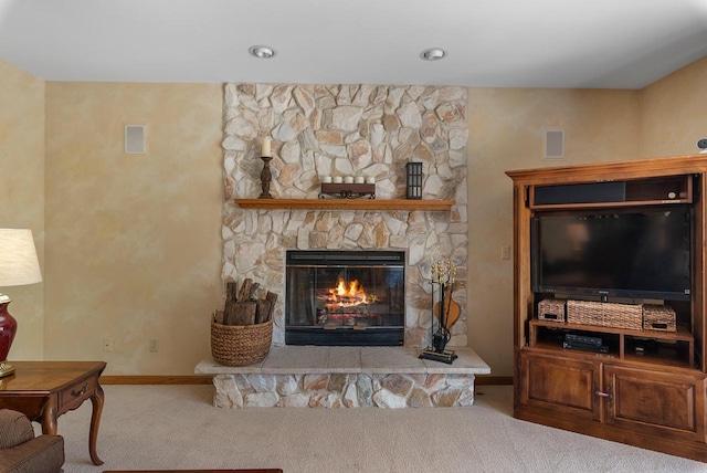 1948 Field Cliffe Dr, Richfield, WI 53076 - carpeted living area featuring a stone fireplace and baseboards