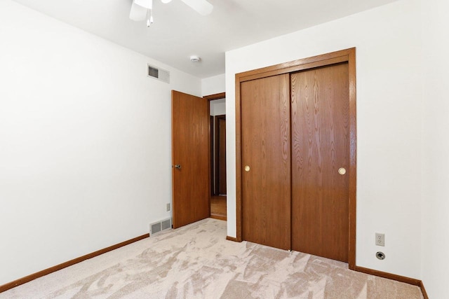 2806 Mckenna Blvd, Madison, WI 53719 - unfurnished bedroom featuring a closet, light colored carpet, and ceiling fan