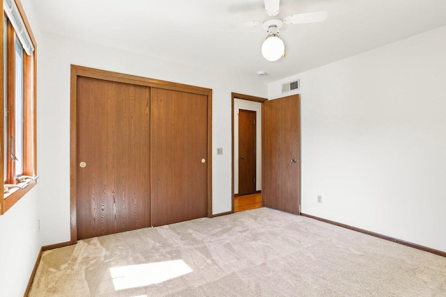 2806 Mckenna Blvd, Madison, WI 53719 - unfurnished bedroom with a closet, carpet floors, and ceiling fan