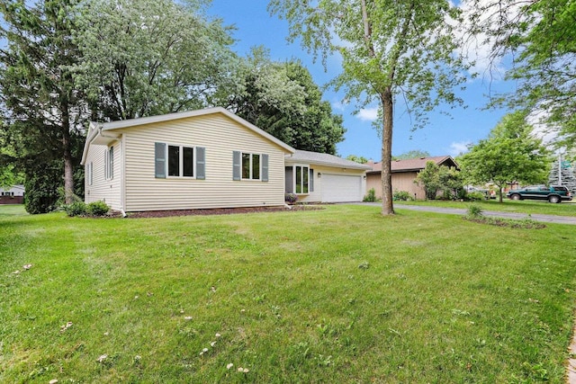2806 Mckenna Blvd, Madison, WI 53719 - ranch-style house with an attached garage, a front lawn, and driveway
